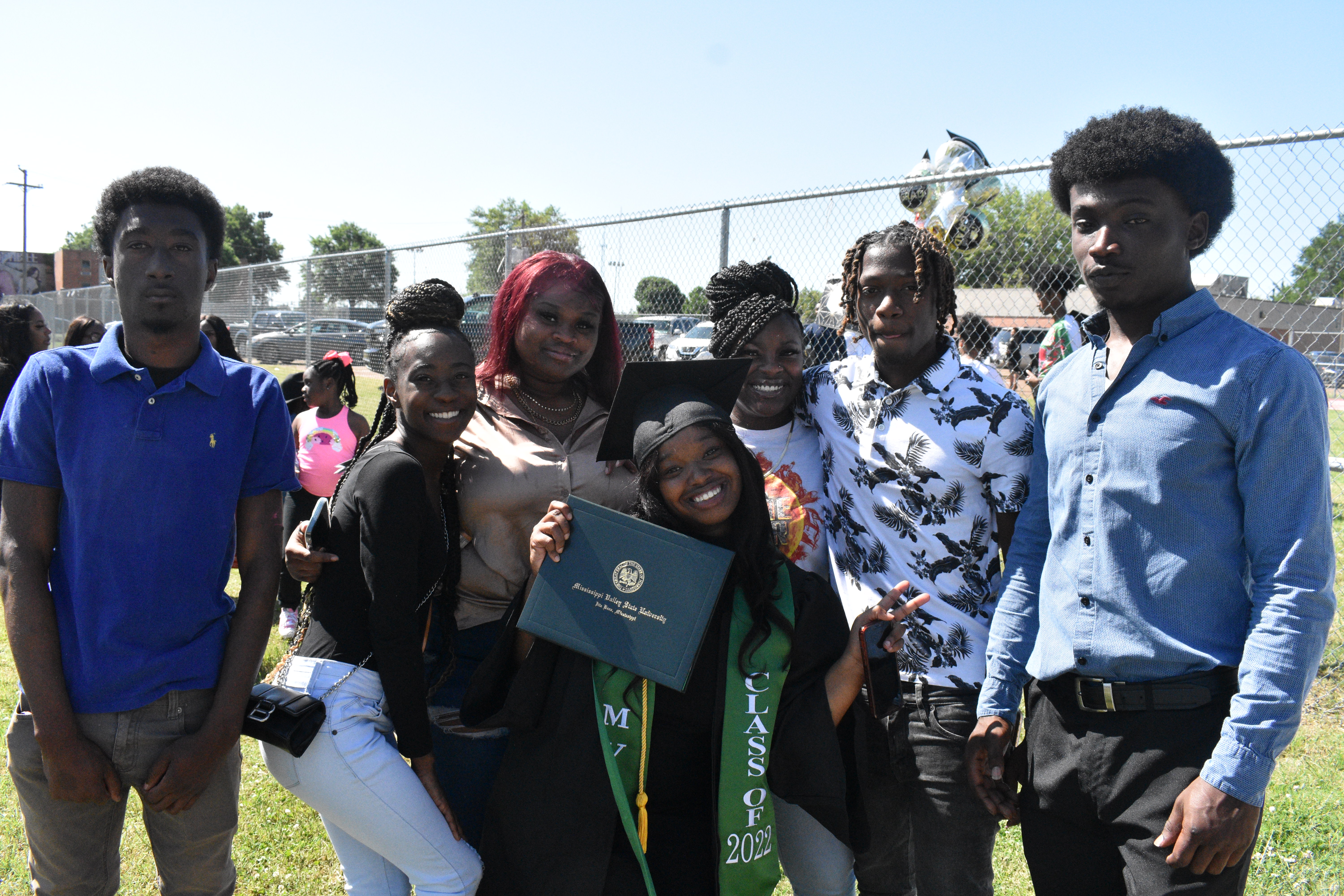  mvsu5- Jakayla Edwards, standing in front, shows off her diploma with her friends. She received a bachelor’s degree in criminal justice. At back, from left, are Reginald Harris, Dominique Cheeks, Zakiya Kirkwood, Joi Green, Jarius Harris and Jeremy Robinson. 
