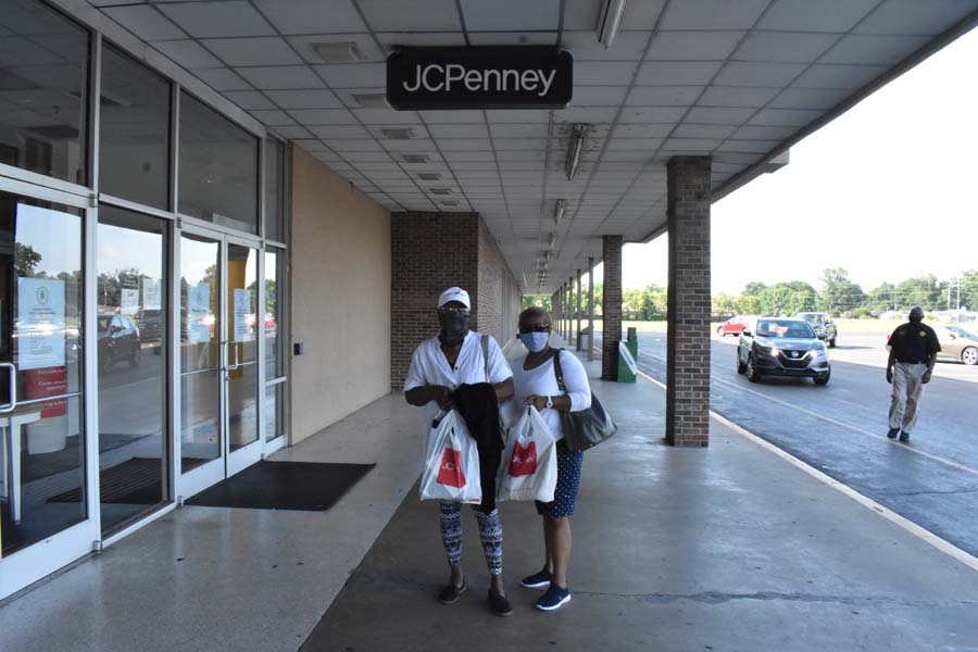 Roosevelt Harper, left, and Janice Harper, both of Lexington, visit the JCPenney store in Greenwood this week. They were disappointed to hear it will close in the fall.