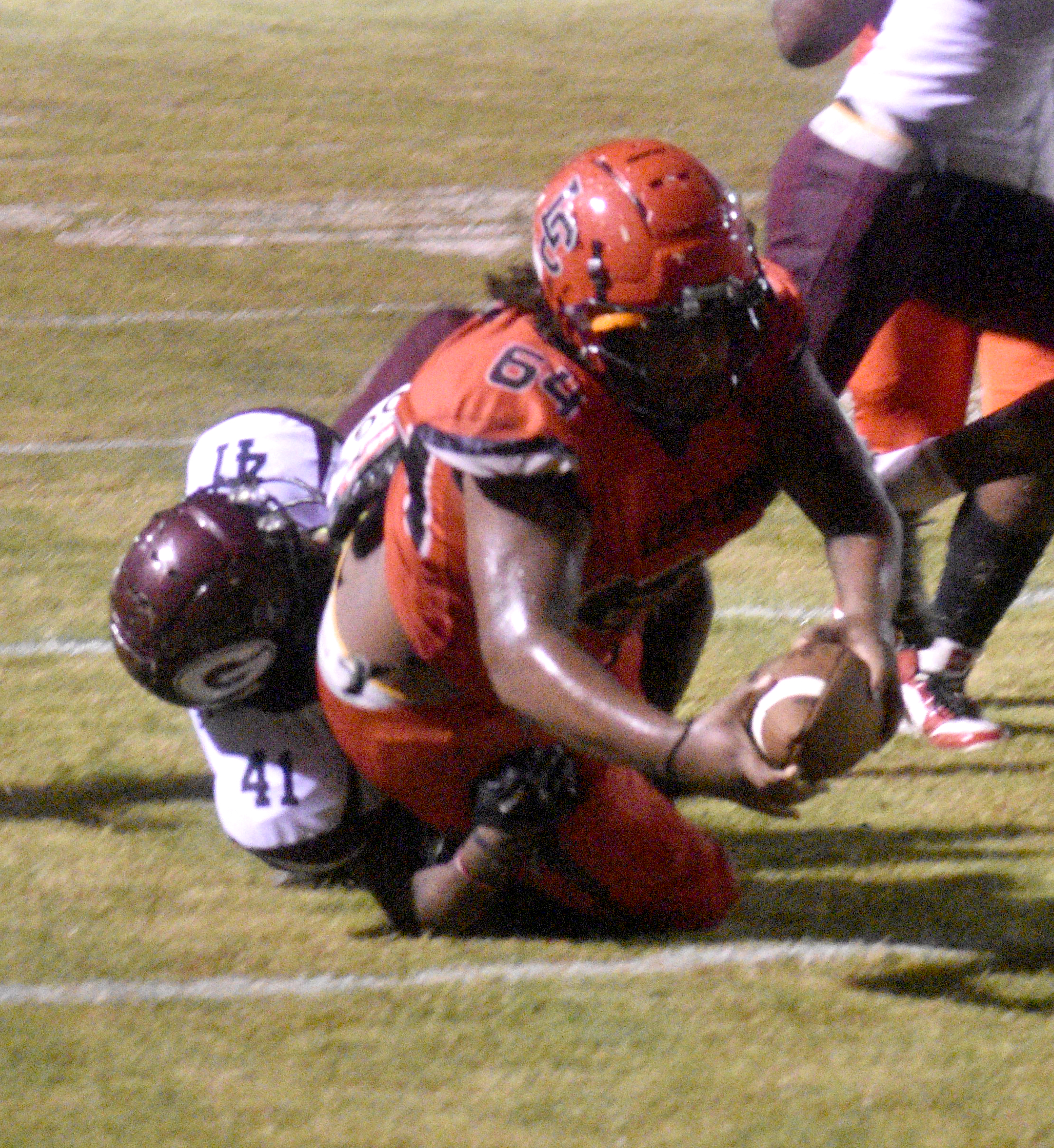 Leflore County’s Maurice Edwards (64) dives into the end zone in the second half as Greenwood linebacker Trenton Smith (41) attempts to make the tackle. Edwards came into the game at fullback for the Tigers on the play. 