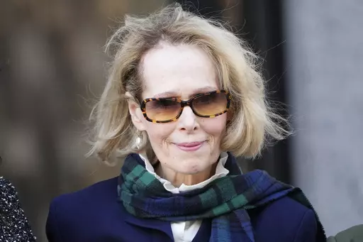 E. Jean Carroll leaves Manhattan federal court, Oct. 23, 2023, in New York. Former President Donald Trump’s lawyers asked a New York judge Friday, Feb. 23, 2024, to suspend an $83.3 million defamation verdict won won by Carroll on the grounds that it likely will not stand. (AP Photo/Frank Franklin II, File)