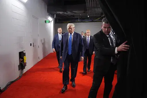 Republican presidential candidate former President Donald Trump arrives during the second day of the Republican National Convention at the Fiserv Forum, Tuesday, July 16, 2024, in Milwaukee. (AP Photo/Evan Vucci, File)