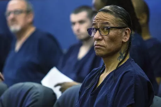 Nathan Chasing Horse sits in court, April 3, 2023, in Las Vegas. The former "Dances with Wolves" actor has been charged in Alberta, Canada, with sexual assault and sexual exploitation. The new charges come months after Chasing Horse was arrested by Las Vegas police and indicted in a sweeping sexual abuse case accusing him of crimes spanning two decades, multiple states and two countries. He now faces criminal sexual assault charges in at least five jurisdictions. (AP Photo/Ty O'Neil, File)