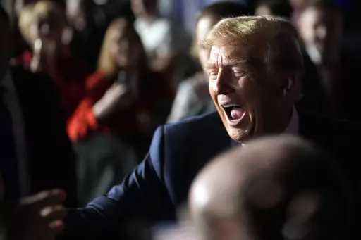 Republican presidential candidate former President Donald Trump greets people after a Fox News Channel town hall Tuesday, Feb. 20, 2024, in Greenville, S.C. (AP Photo/Chris Carlson)