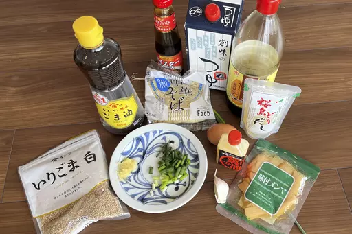 This photo shows the ingredients to cook ramen easily in Tokyo, on April 22, 2024. Ramen noodles are so popular they have become one reason to visit Japan. But ramen can easily be cooked at home too, especially if you can find the ingredients at your neighborhood Asian grocery store. (AP Photo/Yuri Kageyama)
