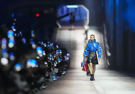Models wear creations for the Louis Vuitton Pre-Fall 2023 show in Seoul, South Korea, Saturday, April 29, 2023. (AP Photo/Lee Jin-man)
