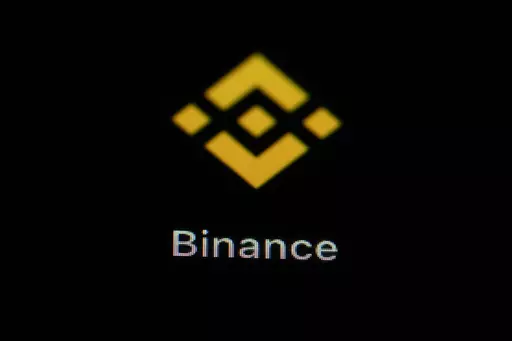 The Binance app icon is seen on a smartphone, Feb. 28, 2023, in Marple Township, Pa. The U.S. Securities and Exchange Commission and Binance have reached an agreement in court, Saturday, June 17, that lets the world's largest cryptocurrency exchange continue to operate in the United States as it battles SEC fraud charges. (AP Photo/Matt Slocum, File)