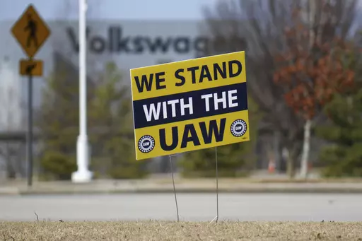 A "We stand with the UAW" sign appears outside of the Volkswagen plant in Chattanooga, Tenn., on Dec. 18, 2023. Workers at at the Tennessee factory are scheduled to finish voting Friday, April 19, 2024, on whether they want to be represented by the United Auto Workers union. (Olivia Ross/Chattanooga Times Free Press via AP, File)