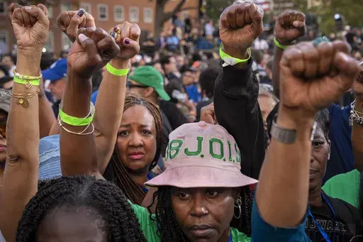 Supporters of Democratic presidential nominee Vice President Kamala Harris hold up their fists in the air in unison after she delivered a concession speech after the 2024 presidential election, Nov. 6, 2024, on the campus of Howard University in Washington. (AP Photo/Jacquelyn Martin, File)