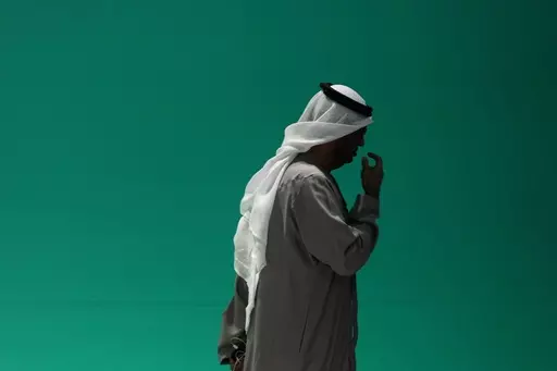 COP28 President Sultan al-Jaber leaves a plenary session at the COP28 U.N. Climate Summit, Wednesday, Dec. 13, 2023, in Dubai, United Arab Emirates. (AP Photo/Kamran Jebreili)