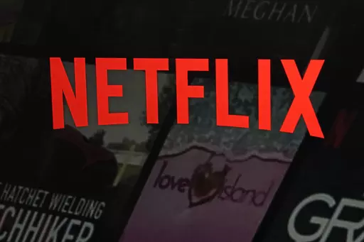 The Netflix logo is shown in this photo from the company's website, in New York, Feb. 2, 2023. Since late last century and the early days of the web, providers of digital media like Netflix and Spotify have had a free pass when it comes to international taxes on films, video games and music that are shipped across borders through the internet. But now, a global consensus on the issue may be starting to crack. (AP Photo/Richard Drew, File)