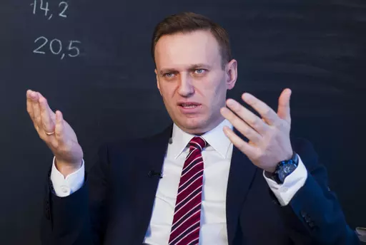 Russian opposition politician Alexei Navalny gestures while speaking during his interview to the Associated Press in Moscow, Russia on Dec. 18, 2017. U.S. intelligence officials have determined that Russian President Vladimir Putin likely didn't order the death of Navalny, the imprisoned opposition leader, in February of 2024. An official says the U.S. intelligence community has found "no smoking gun" that Putin was aware of the timing of Navalny's death or directly ordered it. (AP Photo/Alexand