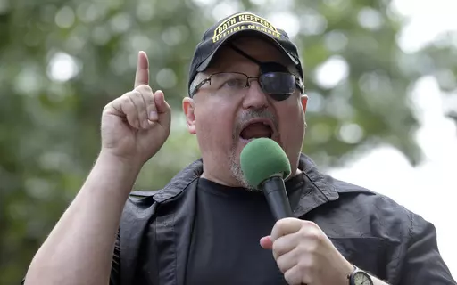 Stewart Rhodes, founder of the Oath Keepers, speaks during a rally outside the White House in Washington, June 25, 2017. A study released on Wednesday, Oct. 25, 2023, has found that people convicted of crimes related to domestic extremism face far shorter prison terms than those convicted in international terrorism cases, even when the crimes are similar. Prosecutors had requested 25 years in prison for Rhodes in a Jan. 6 case. U.S. District Judge Amit Mehta sentenced him to 18 years in May 2023