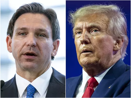 This combination of photos shows Florida Gov. Ron DeSantis speaking on April 21, 2023, in Oxon Hill, Md., left, and former President Donald Trump speaking on March 4, 2023, at National Harbor in Oxon Hill, Md. The competition between Trump and DeSantis is intensifying as the former president is scheduling a return trip to Iowa on the same day that the Florida governor was already going to be in the state that will kick off the Republican contest for the White House. (AP Photo/Alex Brandon)