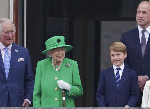 From left, Prince Charles, Queen Elizabeth II, Prince George and Prince William appear on the balcony of Buckingham Palace during the Platinum Jubilee Pageant outside Buckingham Palace in London, Sunday June 5, 2022.  After four days of parades, street parties and a gala concert celebrating Queen Elizabeth II's 70 years on the throne, the Platinum Jubilee ended Sunday with the crowd outside Buckingham Palace singing "God Save the Queen." But as the tributes to the queen's lifetime of service be