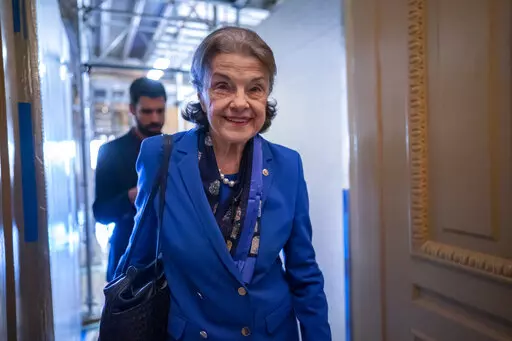 Sen. Dianne Feinstein, D-Calif., walks through a Senate corridor after telling her Democratic colleagues that she will not seek reelection in 2024, at the Capitol in Washington, Tuesday, Feb. 14, 2023. (AP Photo/J. Scott Applewhite)
