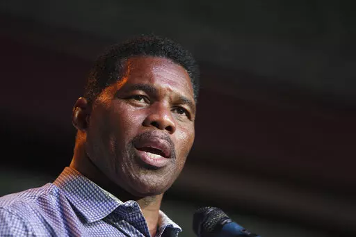 Herschel Walker, GOP candidate for the US Senate for Georgia, speaks at a primary watch party May 23, 2022, at the Foundry restaurant in Athens, Ga. Senate candidate Herschel Walker said Saturday, June 18, that he “never denied" the existence of children he had not previously disclosed publicly, telling conservative Christians that “they knew the truth.” (AP Photo/Akili-Casundria Ramsess, File)