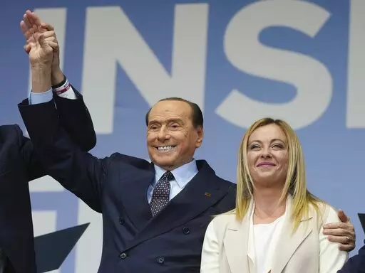 Forza Italia's Silvio Berlusconi, and Brothers of Italy's Giorgia Meloni attend the center-right coalition closing rally in Rome Thursday, Sept. 22, 2022. The resounding victory by far-right leader Giorgia Meloni in Sept. 25 elections for Parliament isn't sitting well with Silvio Berlusconi, the former three-time conservative premier who, 40 years her senior, fancies himself the elder statesman of Italy's political right. (AP Photo/Gregorio Borgia, File)