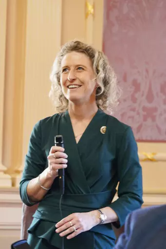 Virginia State Sen. Jennifer Kiggans, R-Virginia Beach, welcomes a visitor to the gallery during the session at the Capitol, Friday March 11, 2022, in Richmond, Va. Crowded Republican congressional primaries in Virginia’s 2nd and 7th districts, on Tuesday, June 21, 2022, will settle who takes on centrist Democrats Elaine Luria and Abigail Spanberger in November’s general elections, which in turn could help determine which party controls the U.S. House. Kiggans is a nurse practitioner and Nav
