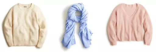 This combination of photos shows a ribbed cashmere crewneck sweater, left, a cashmere wrap, center, and ribbed cashmere V-neck sweater from J.Crew. (J.Crew via AP)