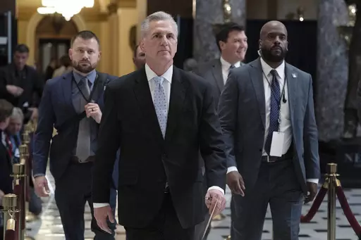 Speaker of the House Kevin McCarthy, R-Calif., walks inside the Capitol in Washington, Thursday, April 27, 2023. House Republicans have narrowly passed a sweeping debt ceiling package as they try to push President Biden into negotiations on federal spending. (AP Photo/Jose Luis Magana)