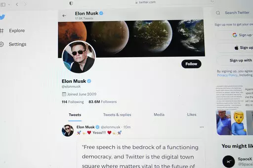The Twitter page of Elon Musk is seen on the screen of a computer in Sausalito, Calif., on Monday, April 25, 2022.  Elon Musk wants to change how Twitter doles out its checkmark badges for verified accounts. While the “blue check” is at times viewed as an elite status symbol for the rich and famous, its purpose has always been to ensure that the people and accounts tweeting are who they say they are. (AP Photo/Eric Risberg, File)