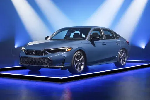 This photo provided by Edmunds shows the 2025 Honda Civic. The hybrid version of the Civic is the Edmunds Top Rated Car for 2025 thanks to its upscale feel and excellent fuel economy. (Courtesy of Edmunds via AP)