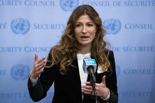 Ms. Emine Dzhaparova, First Deputy Foreign Minister of Ukraine, speaks outside the Security Council chambers at United Nations headquarters, Thursday, Jan. 12, 2023. (AP Photo/John Minchillo)