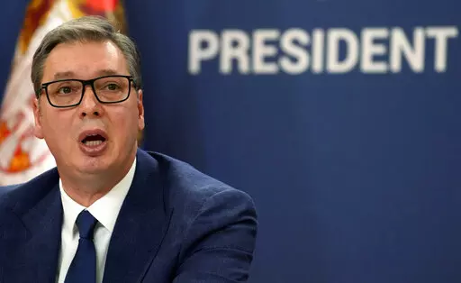 Serbian President Aleksandar Vucic addresses the nation at a news conference in Belgrade, Serbia, Sunday, Aug. 21, 2022. Vucic has called on NATO on Sunday to "do their job" in Kosovo, or Serbia will have to protect its minority in the breakaway province. Address to his nation by Aleksandar Vucic followed the collapse of political talks between Serbian and Kosovo leaders mediated earlier this week by the European Union in Brussels. (AP Photo/Darko Vojinovic)