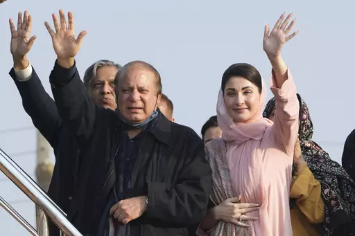 Pakistan's former Prime Minister Nawaz Sharif, center, and his daughter Maryam Nawaz, right, waves to their supporters as they arrive to address an election campaign rally in Hafizabad, Pakistan, Thursday, Jan. 18, 2024. More than 120 million voters in Pakistan get to elect a new parliament on Thursday. The elections are the twelfth in the country's 76-year history, which has been marred by economic crises, military takeovers and martial law, militancy, political upheavals and wars with India. (