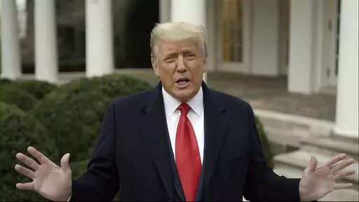 This exhibit from video released by the House Select Committee, shows President Donald Trump recording a video statement on the afternoon of Jan. 6, 2021, from the Rose Garden at the White House in Washington. Trump's lawyers have suggested their strategy in his election interference case in Washington involves distancing their client from the horde of U.S. Capitol rioters, whom the former president has embraced on the campaign trail.(House Select Committee via AP)