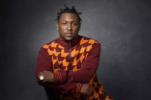 Record producer and recording artist Hit-Boy poses for a portrait, Tuesday, March 8, 2022, in Los Angeles. When Hit-Boy walks the Grammy red carpet, he expects to proudly strut into the Feb. 4, 2024 awards ceremony with his father beside him for the first time. (AP Photo/Chris Pizzello, File)