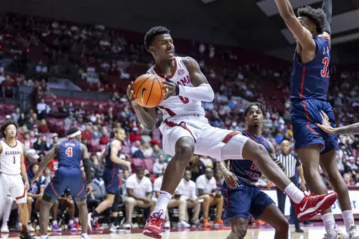 Alabama guard Jaden Bradley (0) looks for a passing outlet against Jackson State during the first half of an NCAA college basketball game, Tuesday, Dec. 20, 2022, in Tuscaloosa, Ala. (AP Photo/Vasha Hunt)