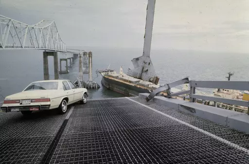 A car is halted at the edge of the Sunshine Skyway Bridge across Tampa Bay, Fla., after the freighter Summit Venture struck the bridge during a thunderstorm and tore away a large part of the span, May 9 1980. A container ship struck a major bridge in Baltimore early Tuesday, March 26, 2024, causing it to plunge into the river below. From 1960 to 2015, there have been 35 major bridge collapses worldwide due to ship or barge collision. (AP Photo/Jackie Green, File)