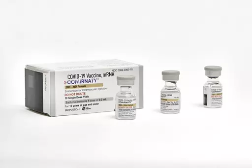 This photo provided by Pfizer in September 2023 shows single-dose vials of the company's updated COVID vaccine for adults. U.S. regulators have approved updated COVID-19 vaccines from Pfizer and Moderna, shots aimed at revving up protection this fall and winter. The Food and Drug Administration's decision Monday, Sept. 11, 2023 is part of a shift to treat fall COVID-19 vaccine updates much like getting a yearly flu shot. (Pfizer via AP)