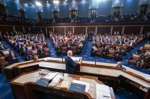 President Joe Biden delivers his first State of the Union address to a joint session of Congress at the Capitol, March 1, 2022, in Washington. When lawmakers gather for President Joe Biden's State of the Union address, the Republican side of the aisle will look slightly different than in years past. The House Republican majority has Black, Latino and female elected officials in their ranks. (Shawn Thew/Pool via AP, File)