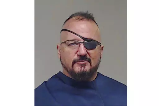 This photo, provided by the Collin County Sheriff's Office shows Stewart Rhodes. A federal judge refused on Friday, Feb. 18, 2022, to free Oath Keepers founder Rhodes from jail while he awaits trial on charges that he plotted with other members of his far-right militia group to attack the U.S. Capitol to stop Congress from certifying President Joe Biden's electoral victory. (Collin County Sheriff's Office via AP, File)