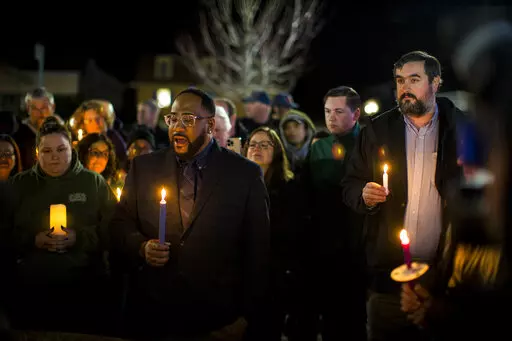Newport News Councilman Elect John Eley, South District 3, speaks at a candlelight vigil in honor of Richneck Elementary School first-grade teacher Abby Zwerner at the School Administration Building in Newport News, Va., Monday, Jan. 9, 2023. Eley served on the Newport News School Board before being elected a councilman. Zwerner was shot and wounded by a 6-year-old student while teaching class on Friday, Jan. 6. (AP Photo/John C. Clark)