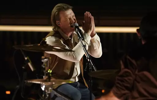 Morgan Wallen performs at the Billboard Music Awards on Sunday, May 15, 2022, at the MGM Grand Garden Arena in Las Vegas. (AP Photo/Chris Pizzello)
