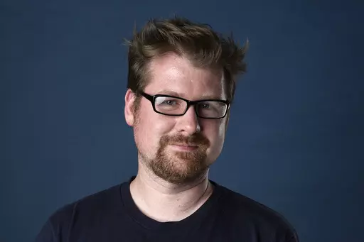 Justin Roiland poses for a portrait to promote the television series "Rick and Morty" on day two of Comic-Con International, July 21, 2017, in San Diego. California prosecutors on Wednesday, March 22, 2023, dropped domestic violence charges against Roiland. (Photo by Chris Pizzello/Invision/AP, File)