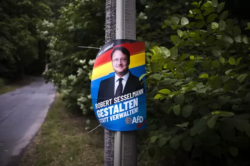 A election campaign poster of far-right AfD candidate Robert Sesselmann remains at a street at the outskirts of the small city Sonneberg at the German federal state Thuringia, Wednesday, July 5, 2023. The Alternative for Germany, or AfD, candidate Robert Sesselmann won the runoff election for a local county administrator in Sonneberg county on June 25, 2023. Sonneberg has a relatively small population of 56,800, but the win is a symbolic milestone for the far-right populist party AfD.(AP Photo/M