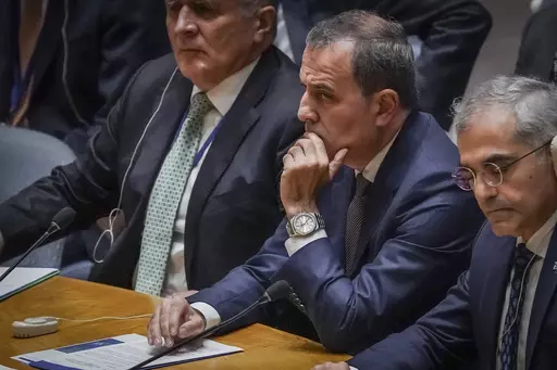 Azerbaijan's Foreign Minister Jeyhun Bayramov, center, listens during a United Nations Security Council meeting on the conflict between Armenia and Azerbaijan, Thursday Sept. 21, 2023 at U.N. headquarters. (AP Photo/Bebeto Matthews)