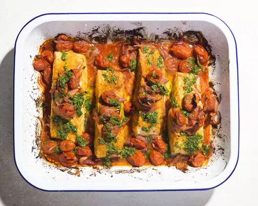 This image released by Milk Street shows a recipe for broiled curried salmon. (Milk Street via AP)
