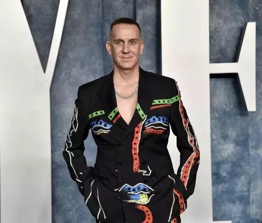 Jeremy Scott appears at the Vanity Fair Oscar Party on Sunday, March 12, 2023, at the Wallis Annenberg Center for the Performing Arts in Beverly Hills, Calif. Scott is stepping down as creative director of Italian luxury house Moschino after a decade of wild and wacky fashion shows and his elegant dressing of numerous celebrities.The company made the announcement Monday in an email statement. (Photo by Evan Agostini/Invision/AP, File)