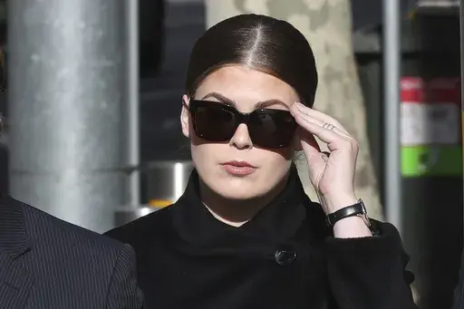 Belle Gibson arrives at the Federal Court in Melbourne, Australia, May 14, 2019. (David Crosling/AAP Image via AP)