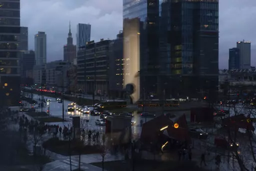 A young Ukrainian girl reflects in a window as she plays at a counselling center run in sponsorship with UNICEF to support refugees in Warsaw, Poland, Thursday, Feb. 2, 2023. Nearly a year has passed since the Feb. 24, 2022, invasion sent millions of people fleeing across Ukraine's border into neighboring Poland, Slovakia, Hungary, Moldova and Romania. At the Warsaw center, psychologists describe treating crying children, teenagers separated from everything they know, mothers unknowingly transfe