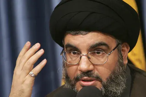 Hezbollah leader Hassan Nasrallah, speaks during a press conference at Hezbollah headquarters in the southern suburb of Beirut, Monday June 5, 2006. (AP Photo/Hussein Malla, File)