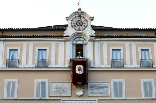 Pope Benedict XVI greets faithful from his summer residence of Castel Gandolfo, the scenic town where he spent his first post-Vatican days and made his last public blessing as pope, Feb. 28, 2013. Pope Emeritus Benedict XVI's death has hit Castel Gandolfo's "castellani" particularly hard, since many knew him personally, and in some ways had already bid him an emotional farewell when he uttered his final words as pope from the palace balcony overlooking the town square. (AP Photo/Luca Bruno, File