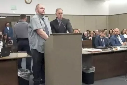 In this image taken from video provided by the Colorado Judicial Branch, Anderson Lee Aldrich, left, the suspect in a mass shooting that killed five people at a Colorado Springs LGBTQ+ nightclub in 2022, appears in court, June 26, 2023, in Colorado Springs, Colo., where they pleaded guilty in the attack. Aldrich was charged with federal hate crimes on Tuesday, Jan. 16, 2024. (Colorado Judicial Branch via AP, File)