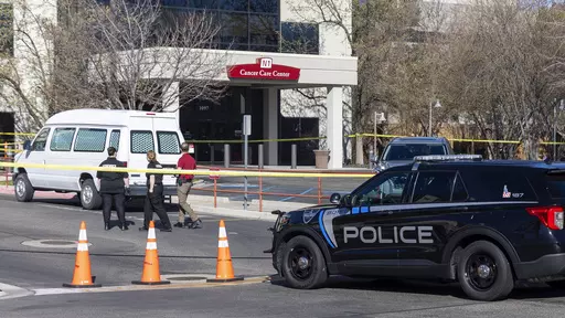 A police vehicle is parked outside Saint Alphonsus Regional Medical Center in Boise, Idaho, on March 20, 2024. Two members of an Idaho white supremacist prison gang, an inmate and the man accused of helping him escape in an armed ambush at a Boise hospital, are due in court for a preliminary hearing Monday, April 8, along with a woman who is accused of providing a vehicle they used during their 36 hours on the run. (Sarah A. Miller/Idaho Statesman via AP, File)