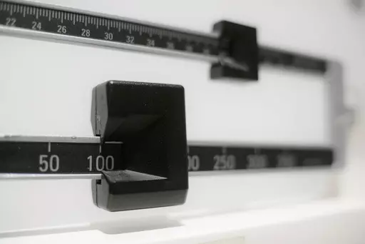 A beam scale is seen in New York on Tuesday, April 3, 2018. A study of young kids in the Women, Infants and Children program adds to evidence that severe obesity is becoming more common in young U.S. children. The update was published Monday, Dec. 18, 2023, in the journal Pediatrics. (AP Photo/Patrick Sison, File)